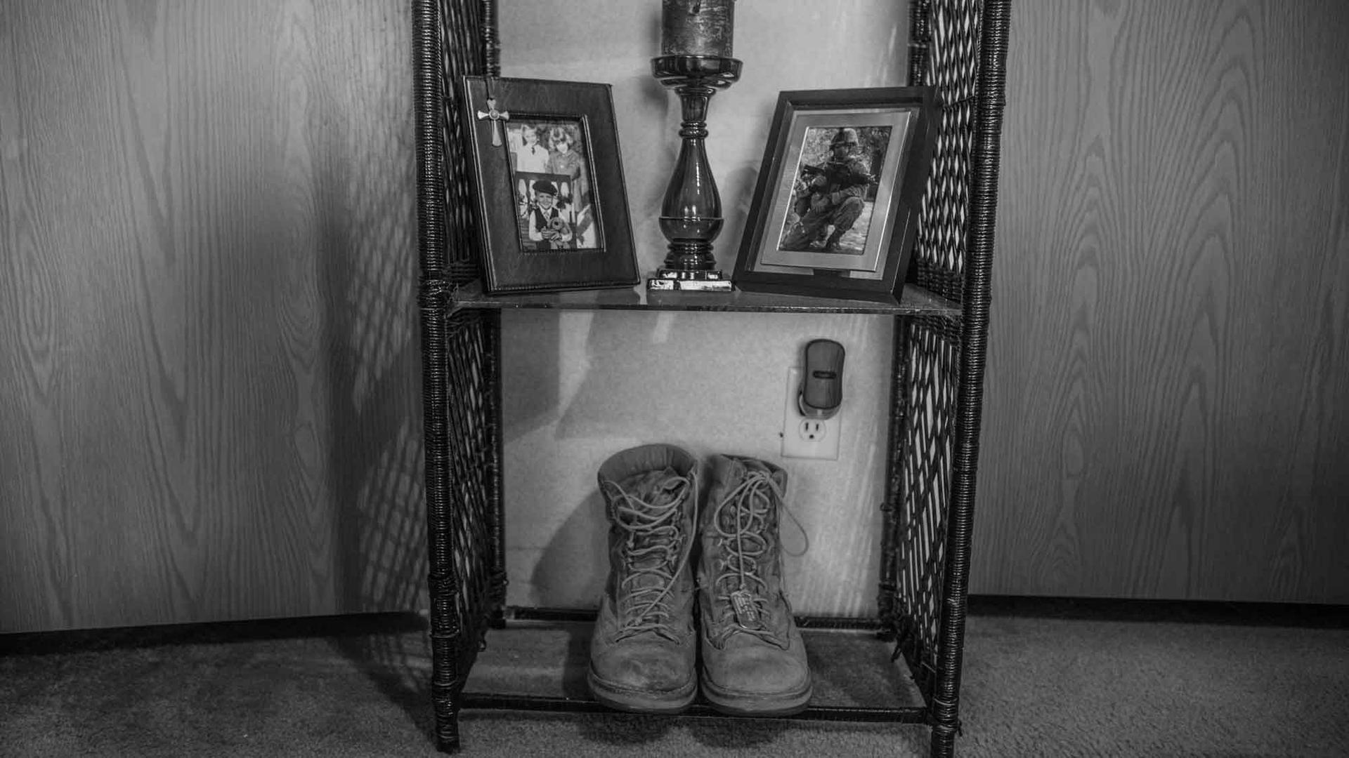 Brandon Ladner. Pelham, Alabama. Ladner's Marine Corps boots sit on a small shelf in his bedroom. Ladner was a US Marine Corps vereran who fought in Afghanistan's Helmand Province. He shot himself inside his living room, and thee bullet remains lodged in 
