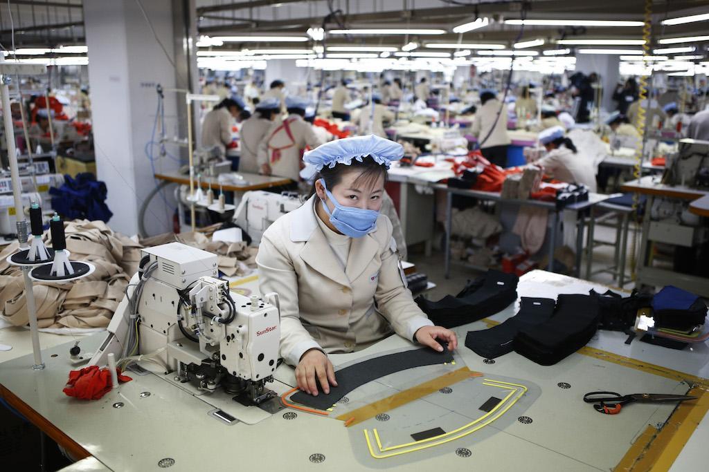 A North Korean at work in the factory of a South Korean company in Kaesong industrial zone inside North Korea, Dec. 19, 2013. 