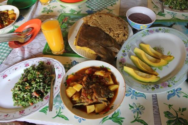 A meal prepared by Joyce Kayongo in Uganda, with native tilapia and greens from a low-tech aquaponic system designed by her husband, Charles Mulamata.  Although they live in the city, nearly all the ingredients were sourced from the neighborhood.