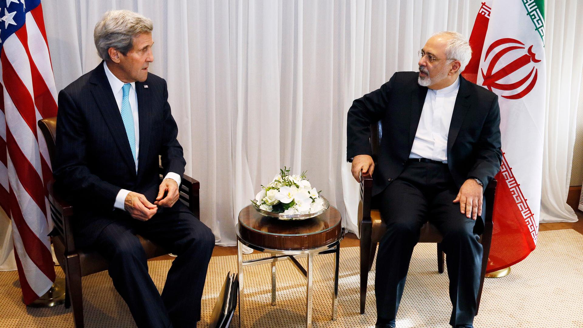US Secretary of State John Kerry sits with Iranian Foreign Minister Mohammad Javad Zarif before a meeting in Geneva in January 2015. Zarif said that his meeting with Kerry was important to see if progress could be made in narrowing differences on his coun