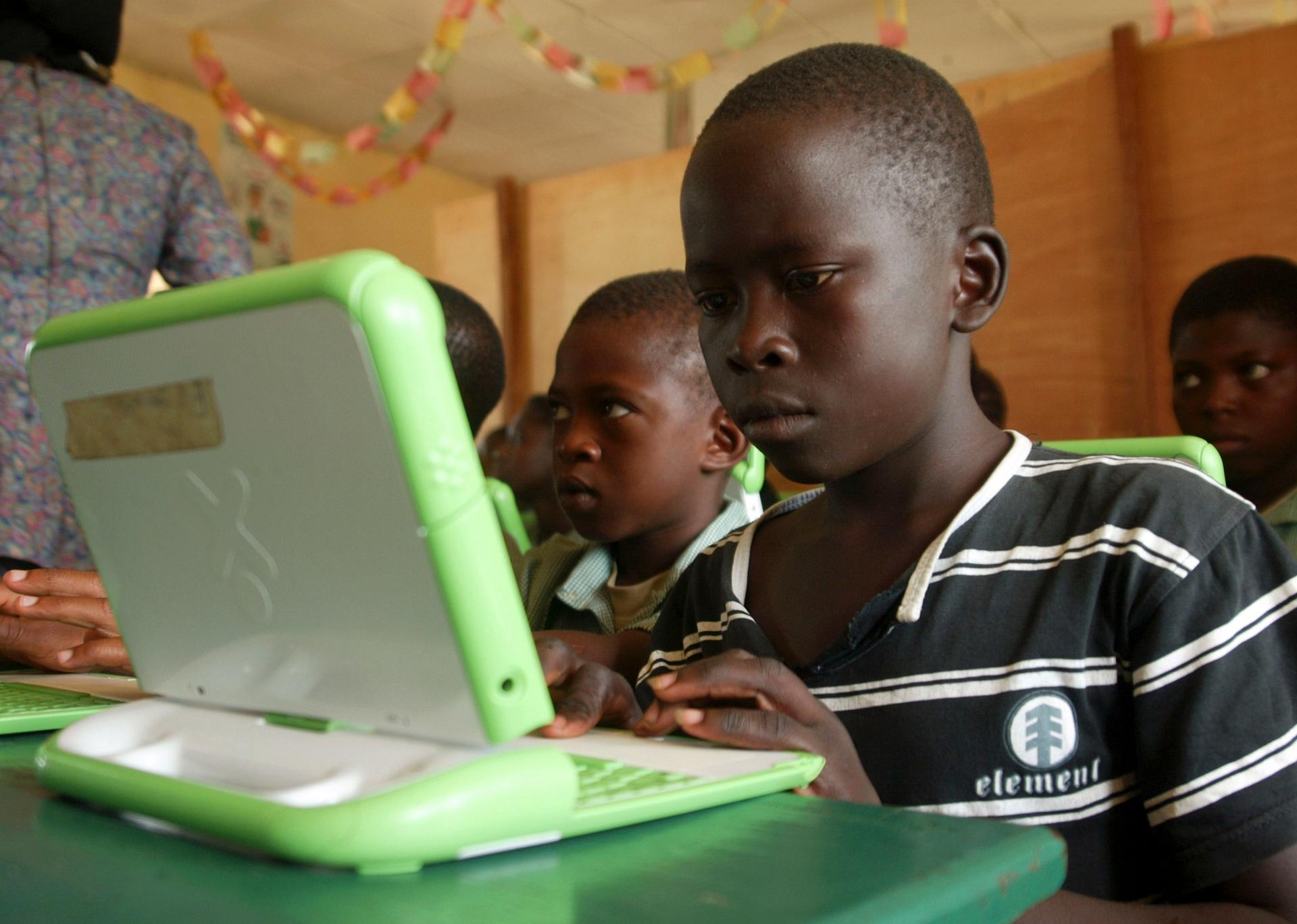 Nigerian pupils work on OLPC computers in Abuja, Nigeria, in May, 2007.