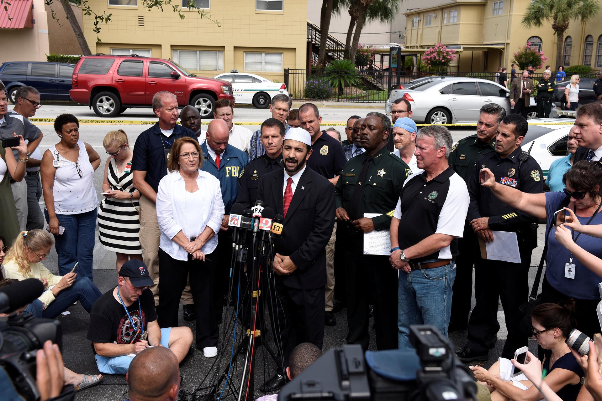 Imam Muhammad Musri speaks at a news conference