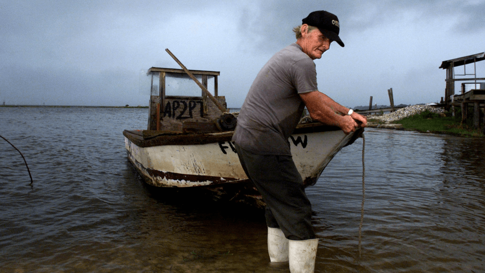 Commercial oyster fisherman Charles King prepairs to pull his aging oyster boat from the rich oystering waters of Apalachicola Bay.