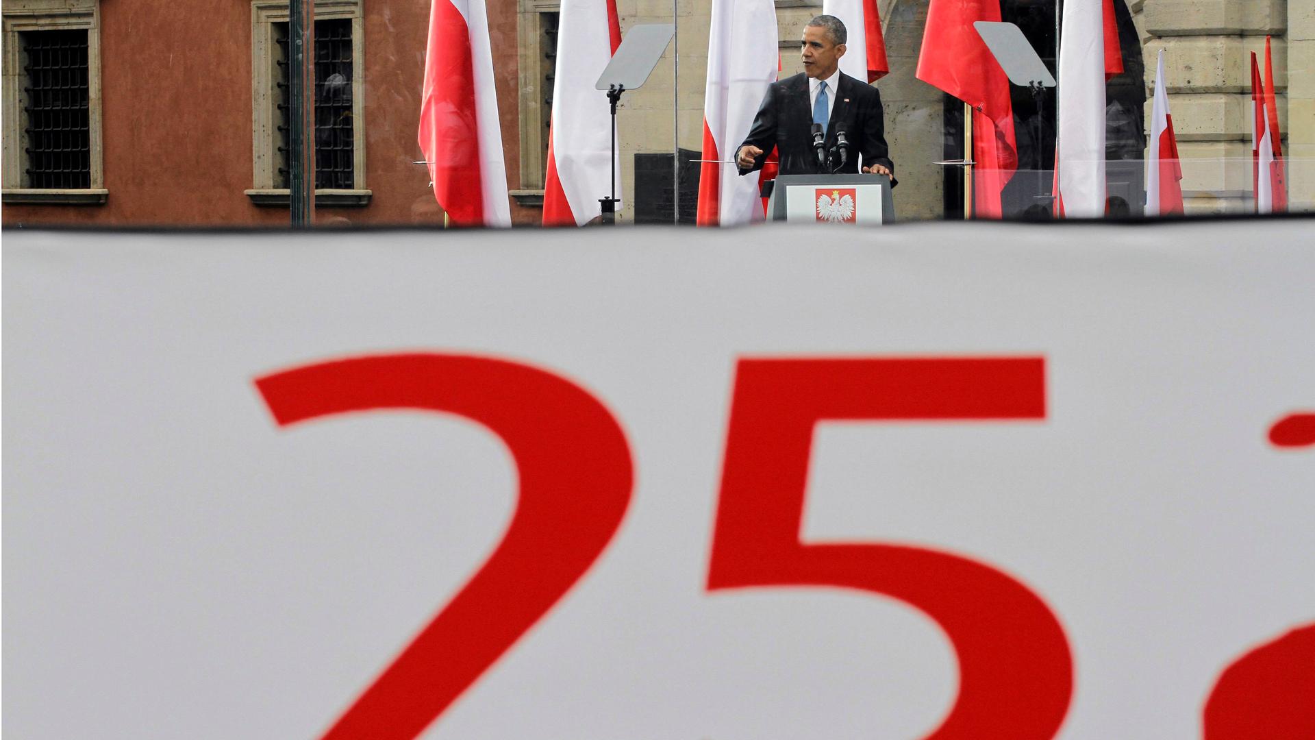 US President Barack Obama speaks during a ceremony marking the "Freedom Day" anniversary in Warsaw's Castle Square June 4, 2014. Obama's visit to Poland coincides with the "Freedom Day" anniversary, marking the holding of the country's first partially-fre