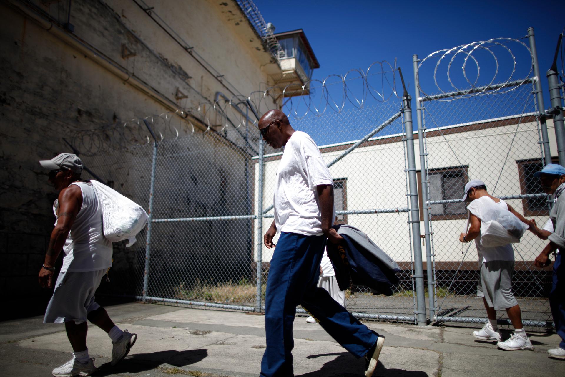 Inmates leave the exercise yard at San Quentin state prison in San Quentin, California.  