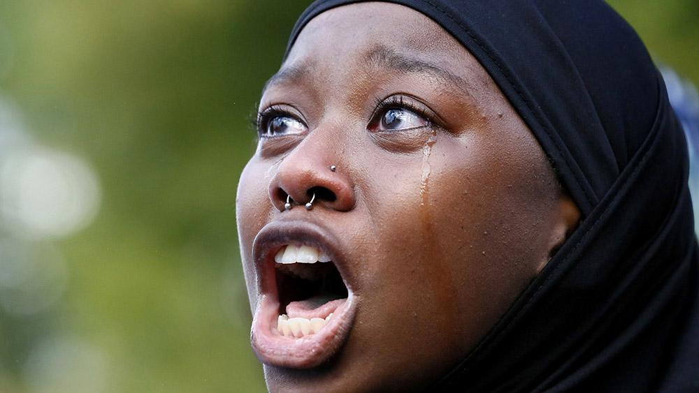 woman protester against police shooting