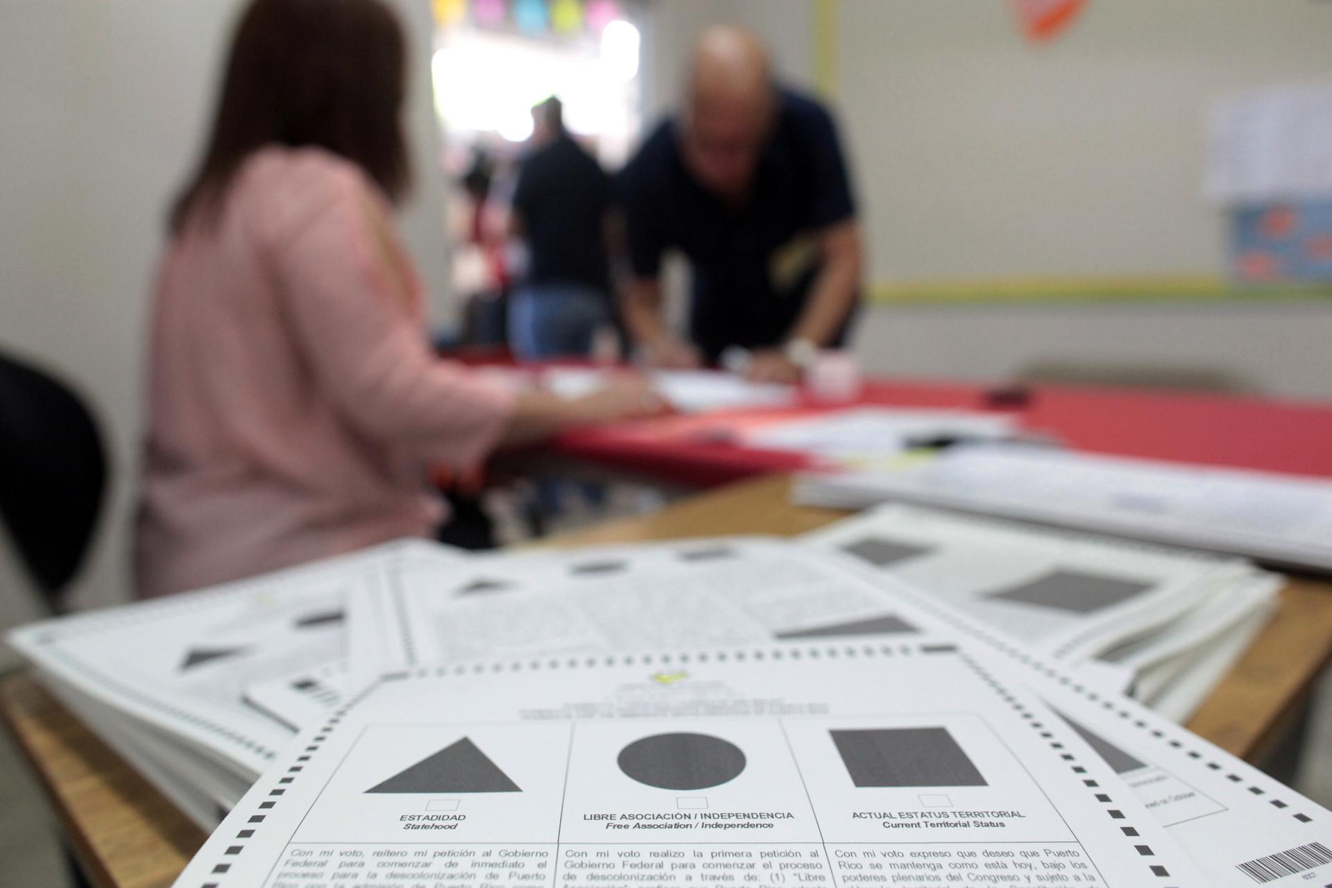 Ballot papers are seen at a polling station