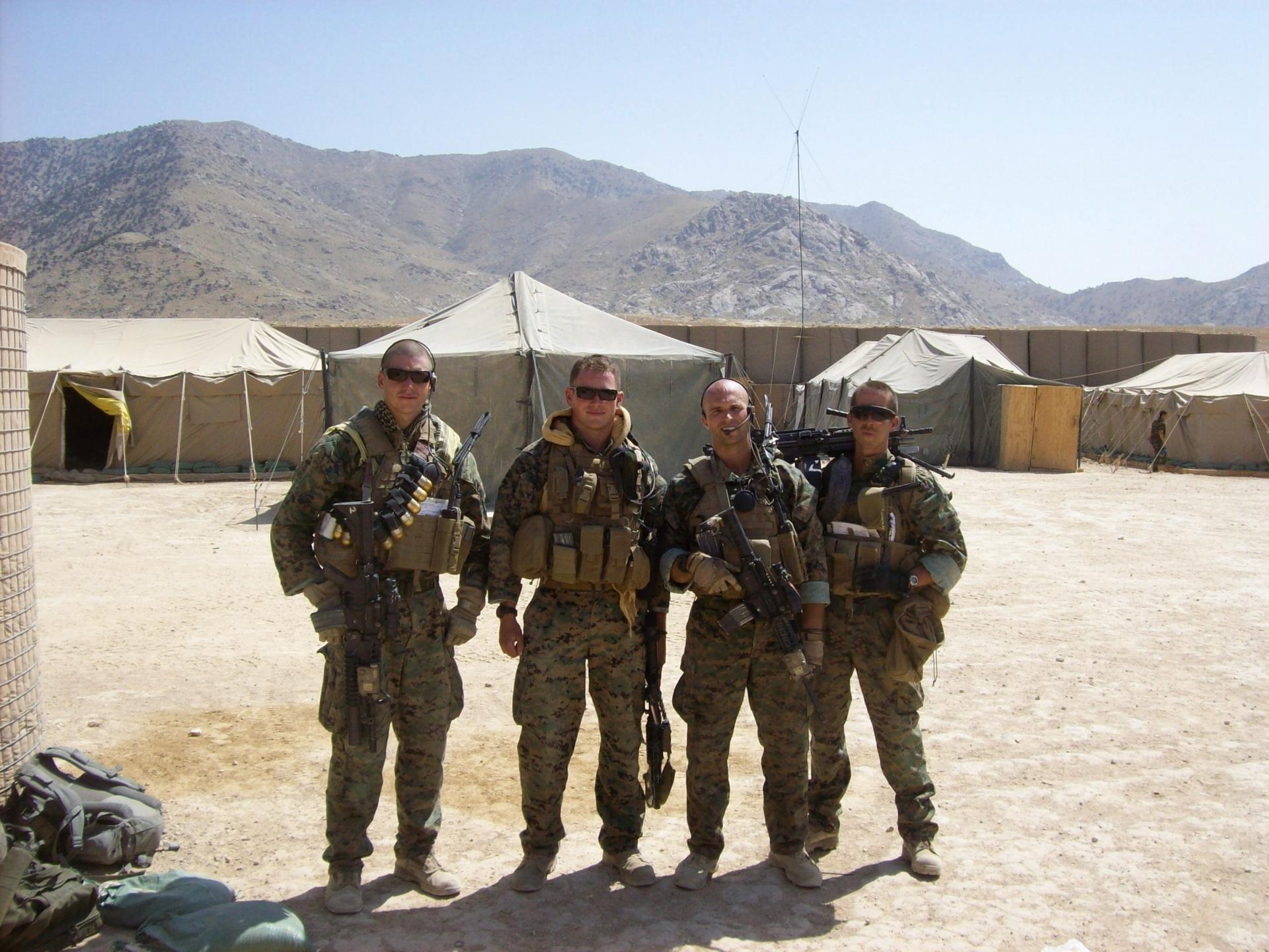 A US Marines Embedded Training Team post patrol aboard Combat Outpost Rocco, Afghanistan, 2009
