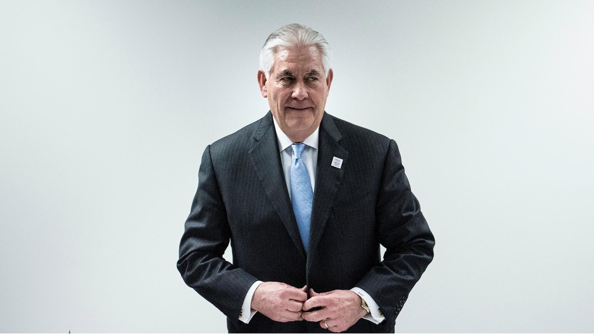 US Secretary of State Rex Tillerson takes his seat for a meeting with his Japanese and South Korean counterparts at the World Conference Center in Bonn, Germany, Feb. 16, 2017.