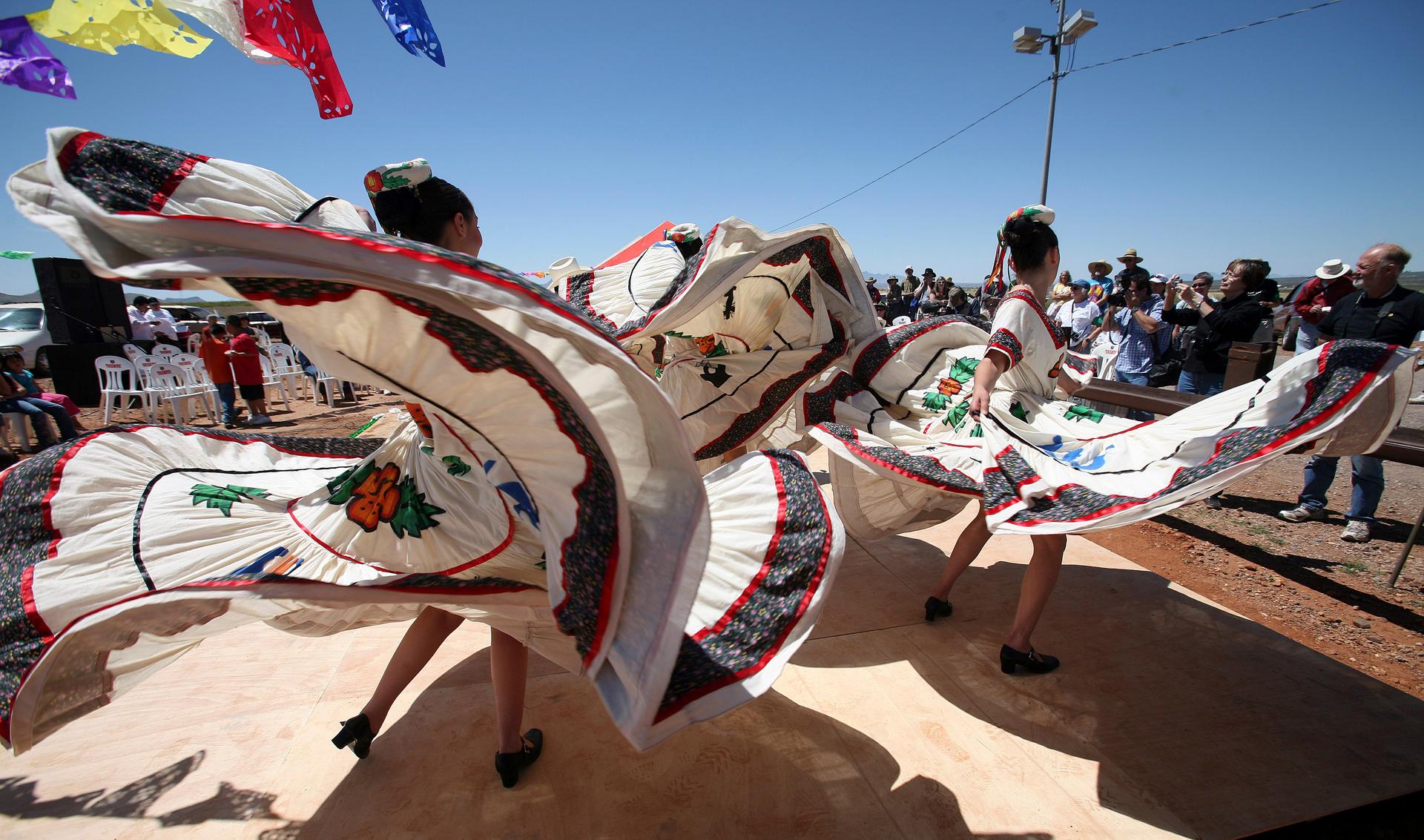 Members of a folklorico dance group from Agua Prieta, Sonora, Mexico, perform