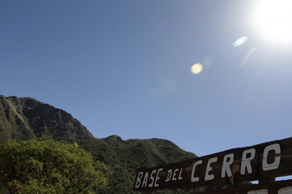 A sign marking the base of the Uritorco hill is seen in the Argentine city of Capilla del Monte, in Cordoba province, December 20, 2012. The mountain is popular among UFO spotters in Argentina.