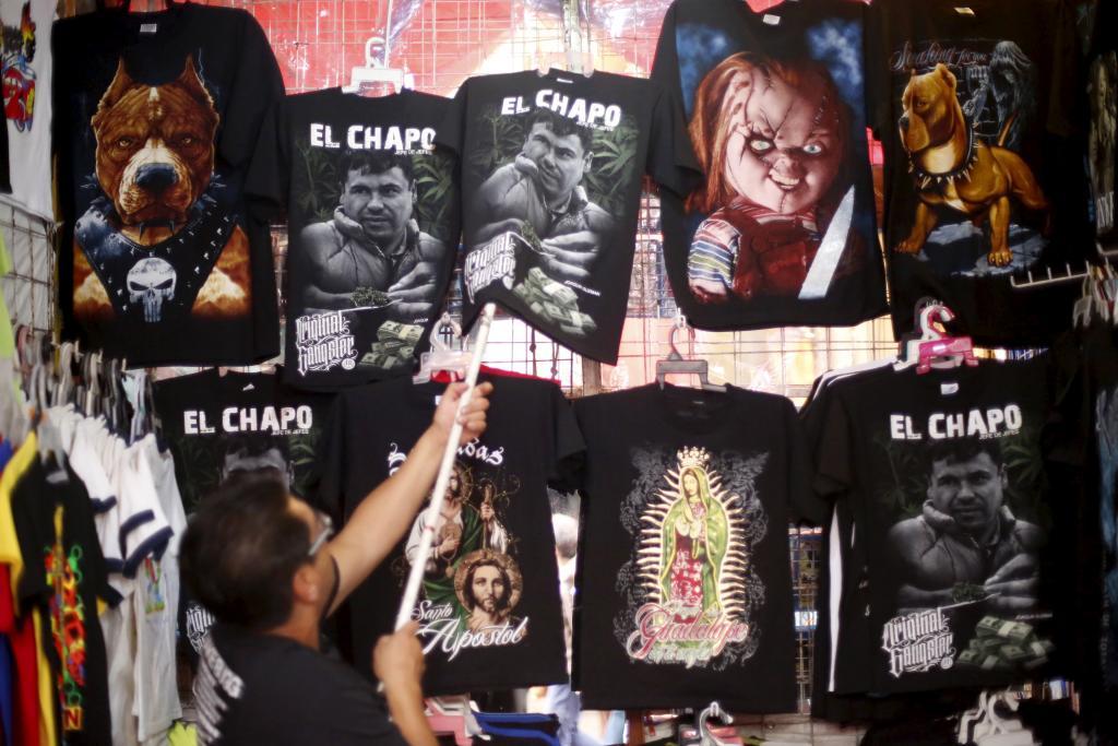 A seller displays El Chapo T-shirts for sale in the Tepito neighborhood of Mexico City on Jan. 25, 2016.