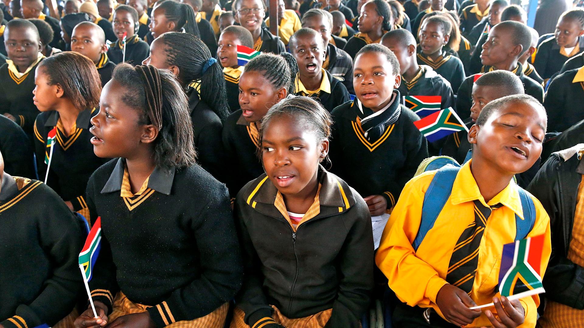 Children at a township school in Atteridgevile, South Africa. In post-apartheid South Africa, children are no longer required to learn the Afrikaans language. 
