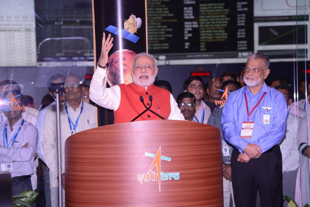 Indian Prime Minister Narendra Modi addresses scientists and Indian officials at the Indian Space Research Organisation's (ISRO) Telemetry, Tracking and Command Network complex in Bangalore after its Mars Orbiter Mission, nicknamed "MOM", successfully ent