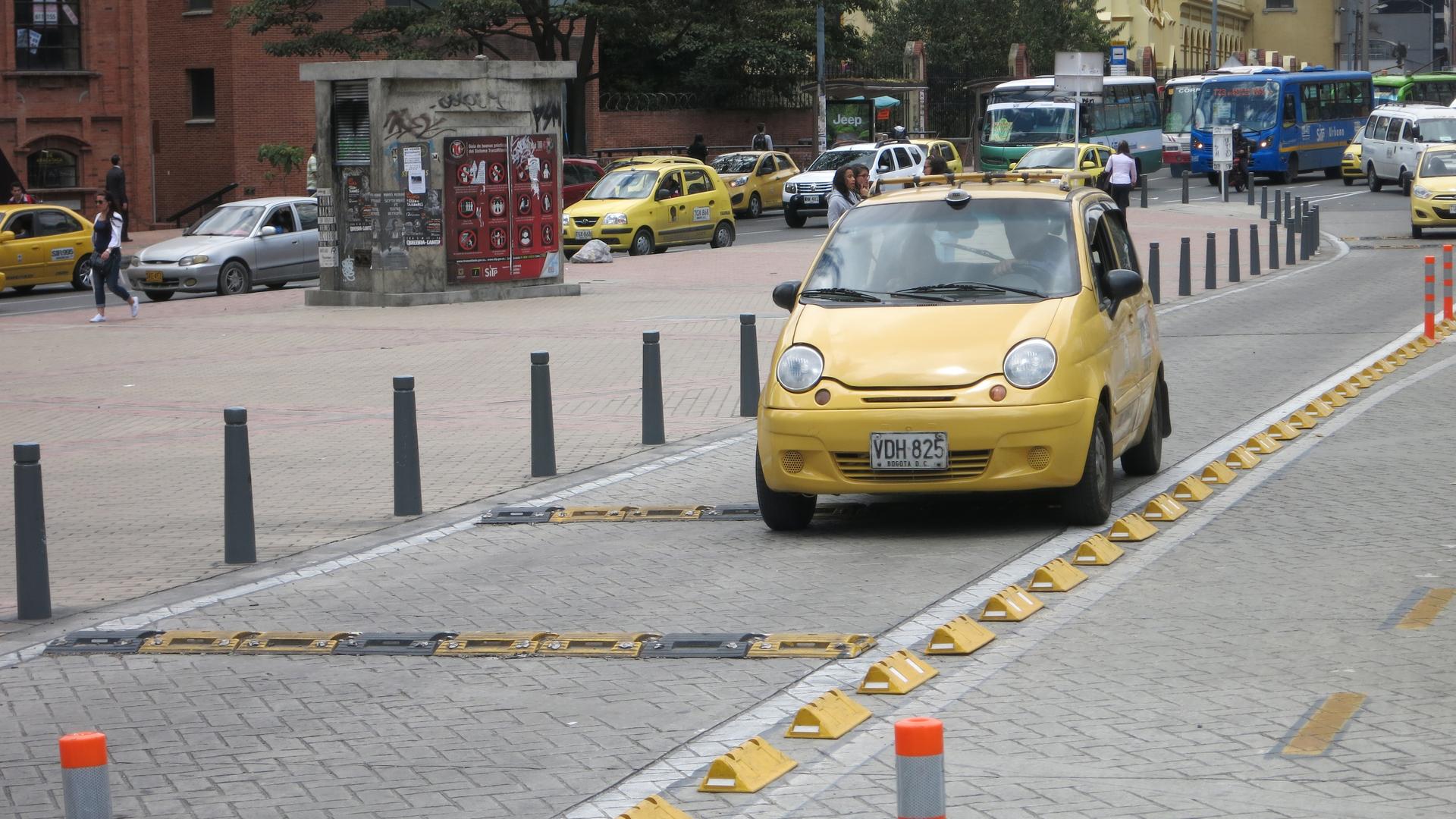 Bogotá has taken a number of design steps to slow cars down and keep them separate from pedestrians and cyclists.