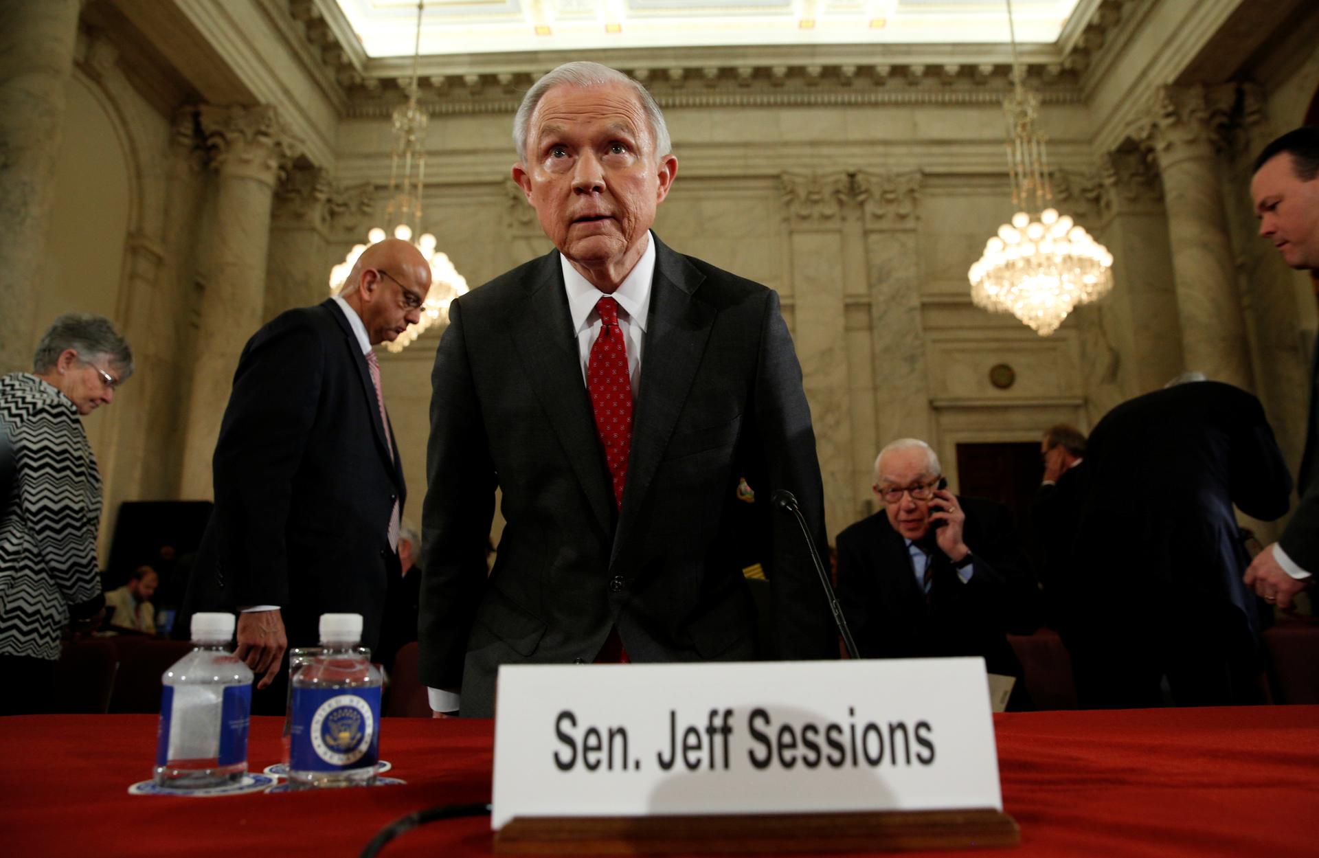 Jeff Sessions takes his seat during his testimony before the Senate Judiciary Committee confirmation hearing
