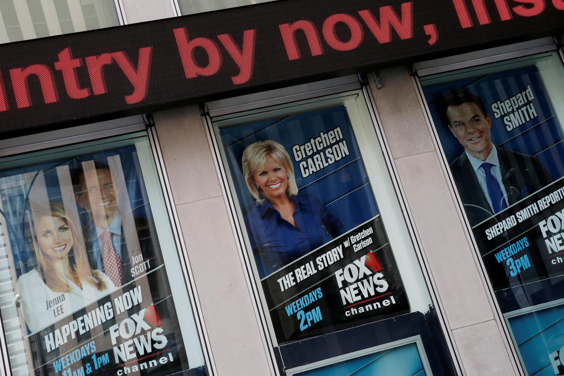 Posters of Fox News personalities including Gretchen Carlson