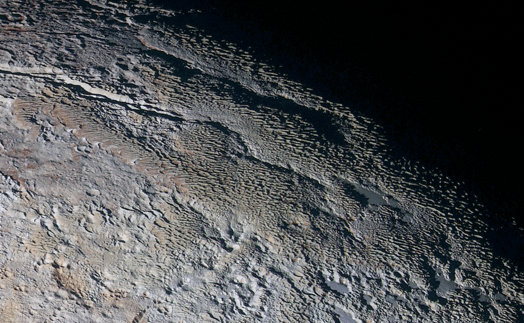 The newly detected features on Pluto's surface have been compared to dragon scales and tree bark