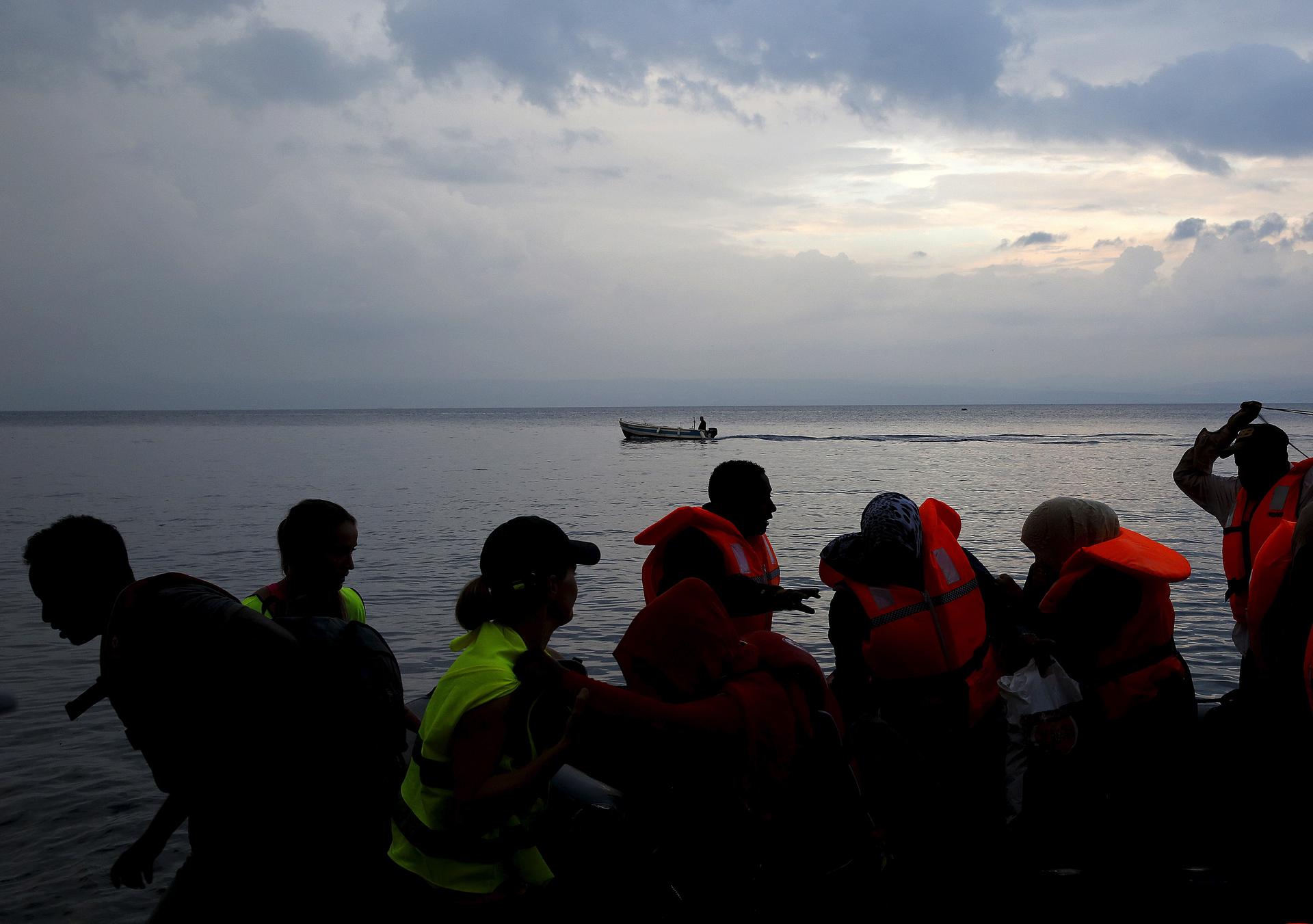 Somali migrants arrive in a dinghy