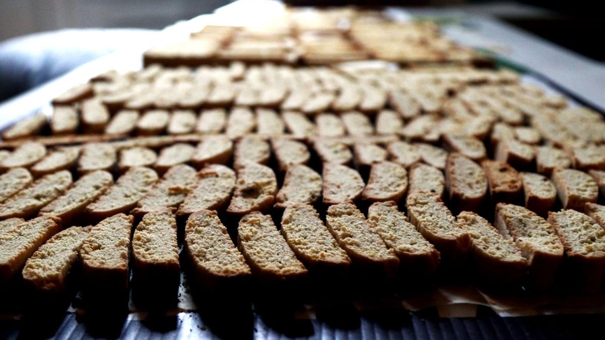 David Roe’s first round of biscotti made with pistachio and almonds. The biscotti are baked first so that they become a little stale by the time they go on the altar.