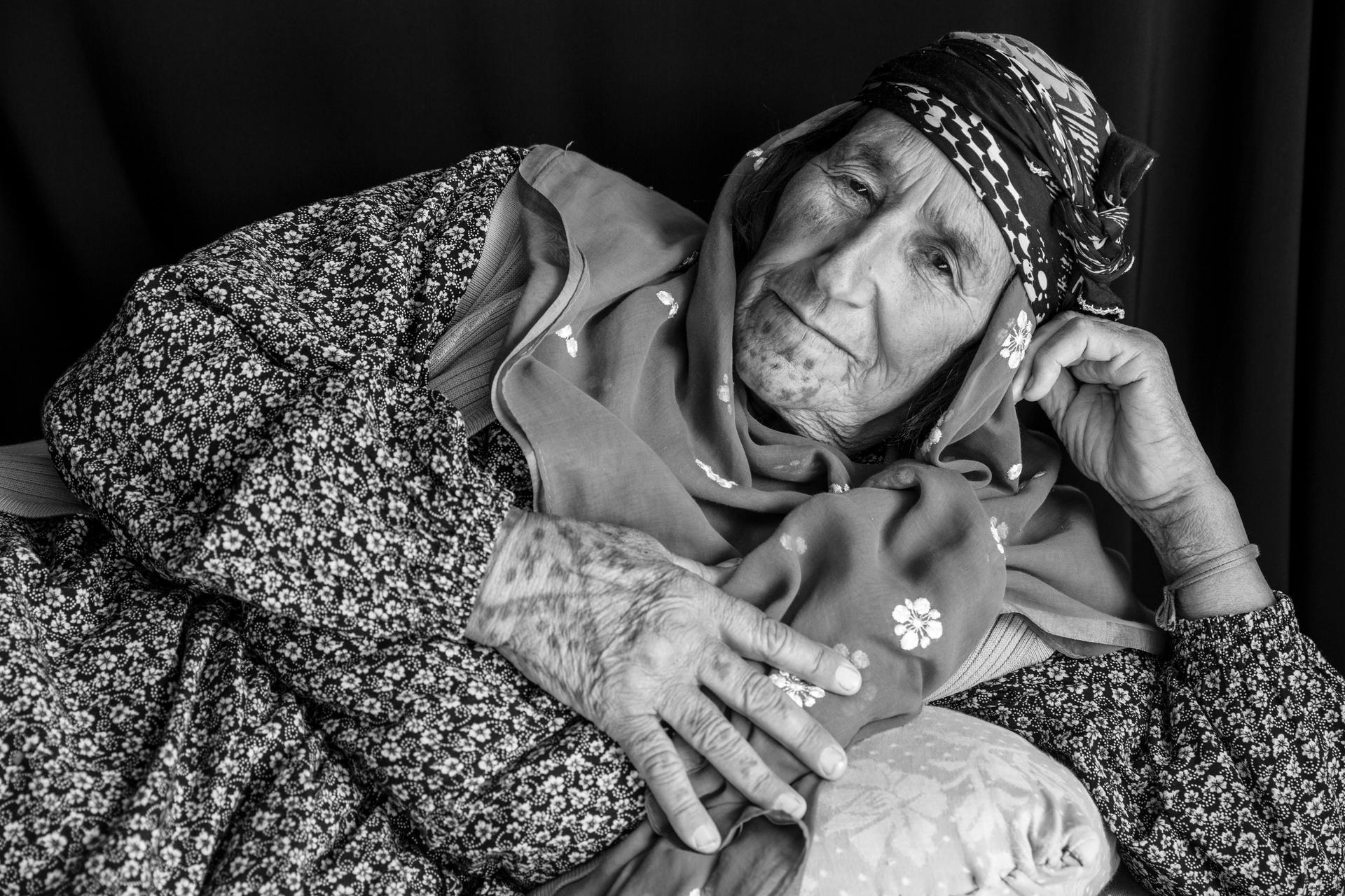 Safi Haso, about 70 years old, from Girik village of Kobani. "We are probably the last generation that has tattoos," she says. "All Kurdish women had them." In addition to facial, hand and neck tattoos, Haso has tattooed her own breast with circles around