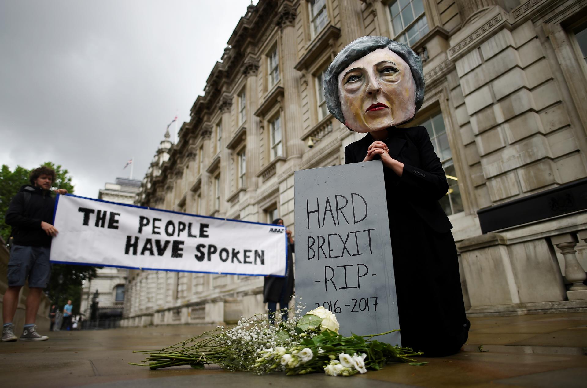 Protestor wearing a Theresa May mask