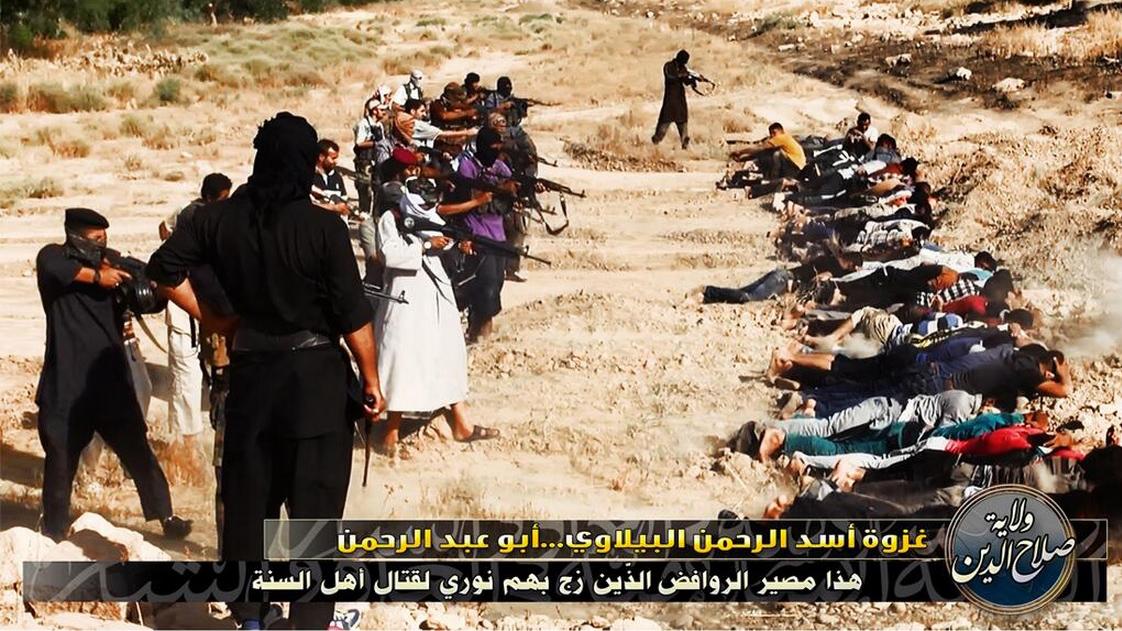 A still shot from one of the videos posted by ISIS purporting to show the killing of captured Iraq government personnel.