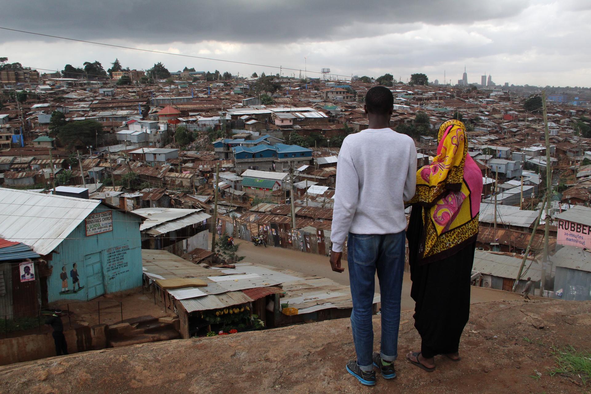Ben and Salma are Kenyan students studying journalism at the Nairobi community news hub, Habari Kibra. They are looking out over their home town, Kibera, one of the largest slums in the world. 
