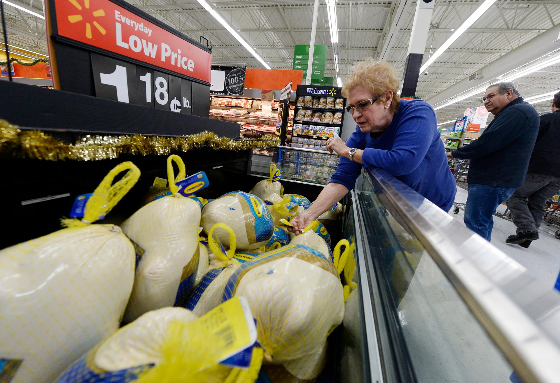 A customer shops for a turkey at a Walmart store in Los Angeles, California