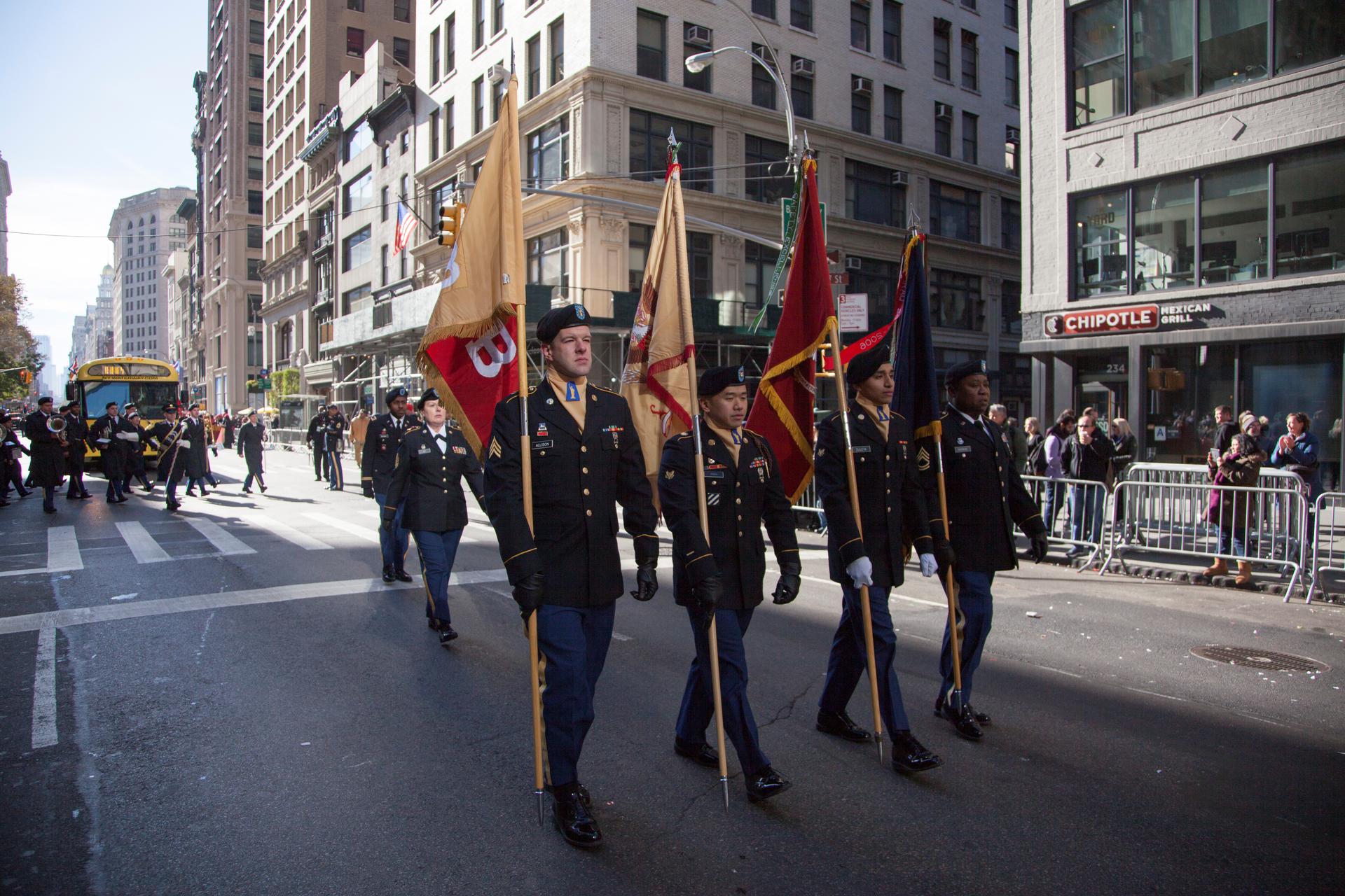 US Army Reserve color guard soldiers carry the colors on Fifth Avenue during the annual New York City Veterans Day Parade in New York, Nov. 11, 2017.