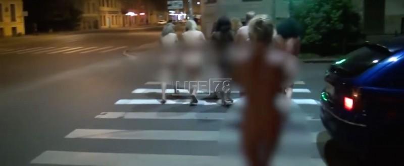 Women forced to walk nude through the streets en route to a police station. “Activists” captured them for practicing prostitution. 