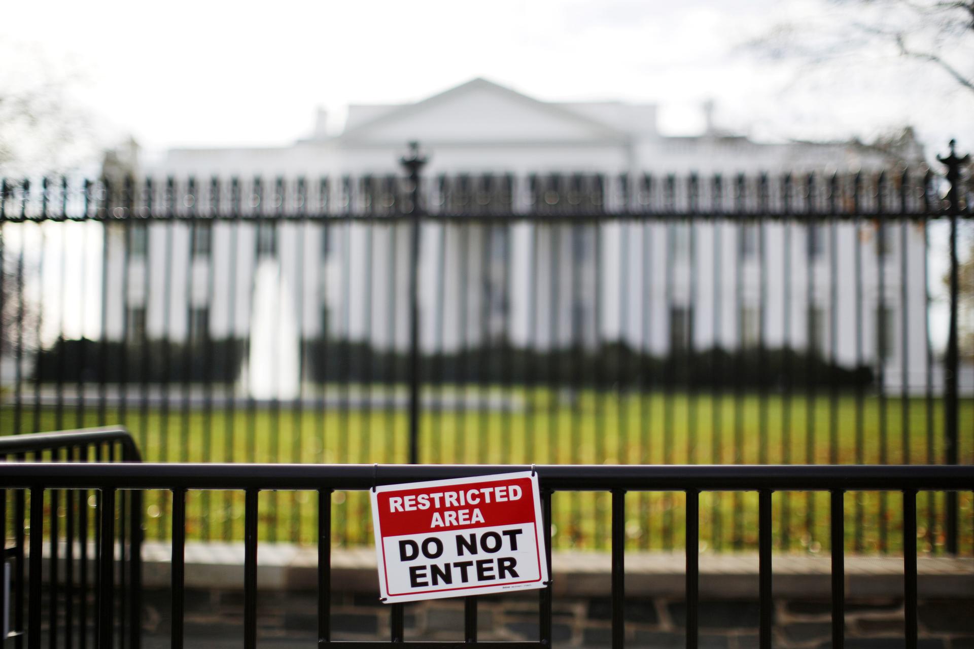 A restricted area sign is seen outside of the White House in Washington November 27, 2015.