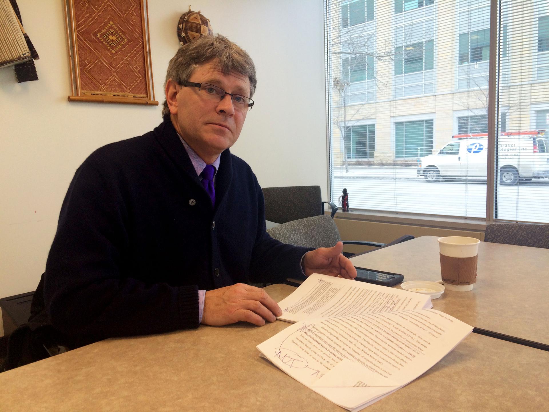 Prof. Virgil Wiebe reads the 123-page decision that halted President Obama's executive action on immigration on Monda.