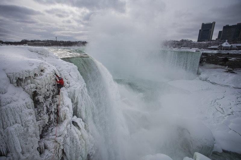 Canadian climber Will Gadd ascending Niagara Falls