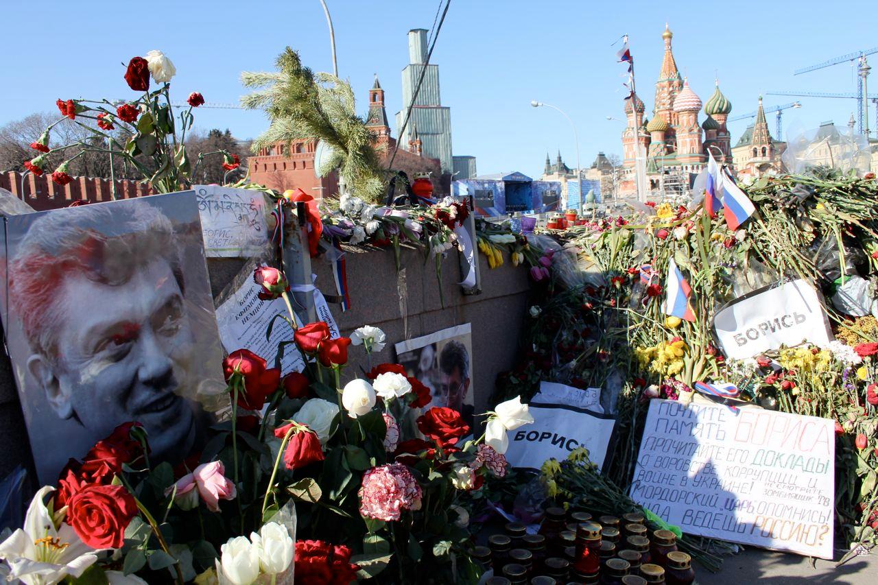 Supporters of Russian opposition leader Boris Nemtsov continue to leave flowers on the bridge where he was shot down more than two weeks ago, within view of the Kremlin.
