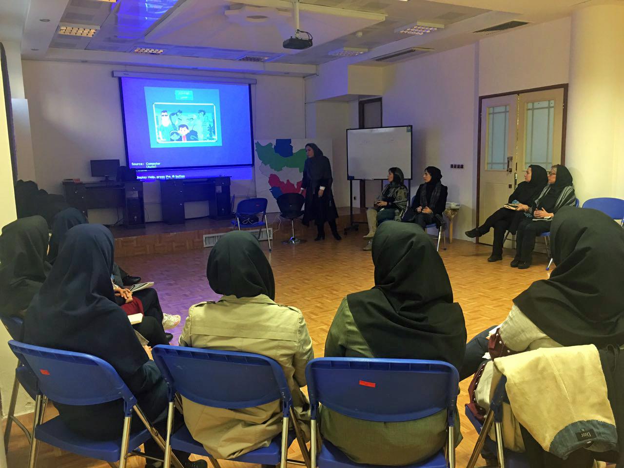 Yassi Ashki teaches a workshop for teachers at a school in Tehran.