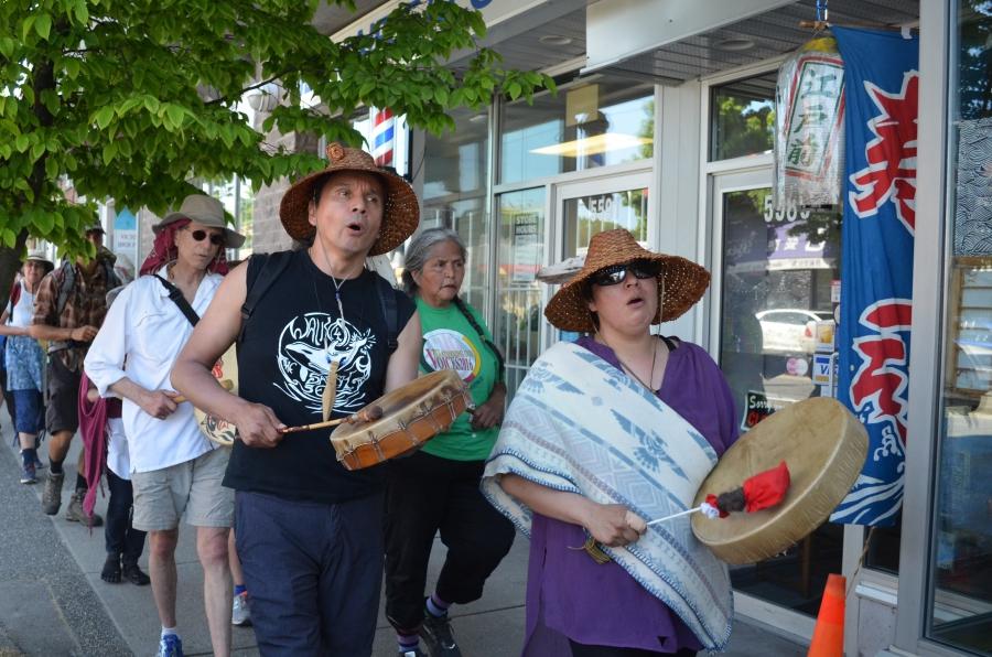 Paul Che oke ten Wagner (front left) leads a march against the new TransMountain pipeline. A member of the Saanich Nation of British Columbia who grew up in Seattle, Wagner joined the fight against the pipeline after friends persuaded him to travel to sim