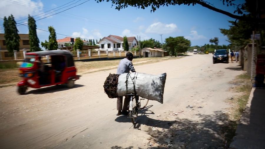 Charcoal is the main cooking fuel for 95% of the residents of Tanzania's fast-growing cities, putting a huge strain the country's forests. It's often sold in bags as big as a person, and then transported by any means available, like this bicycle in Dar es