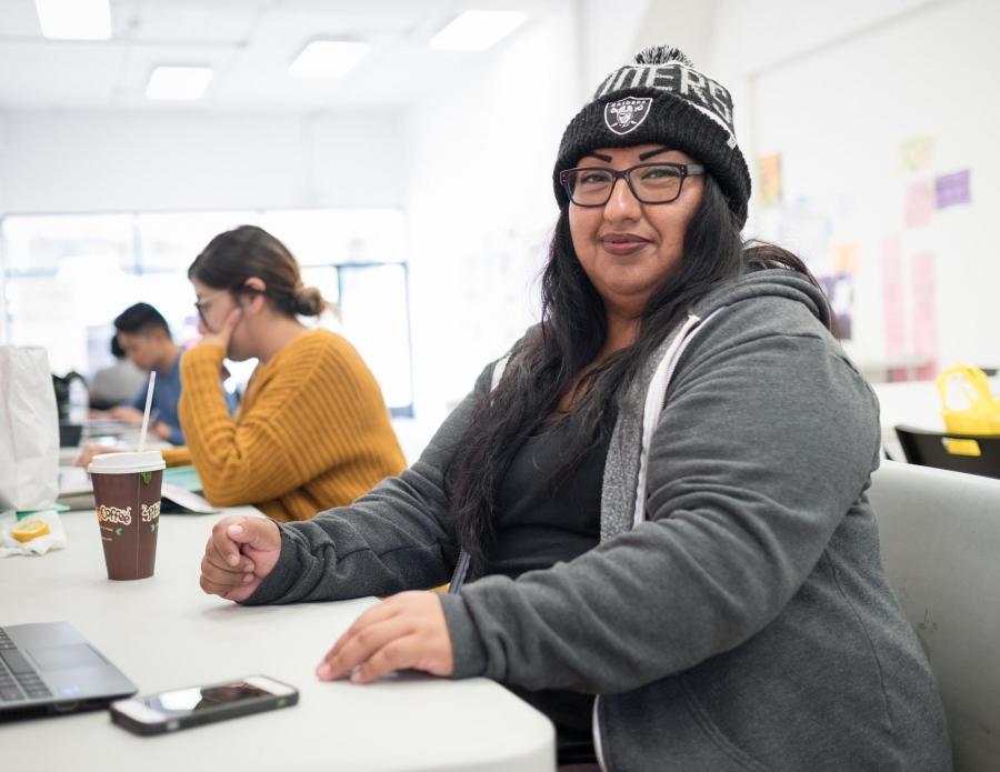 Community organizer Monica Gomez at her desk in the San Francisco vs. Big Soda campaign office.