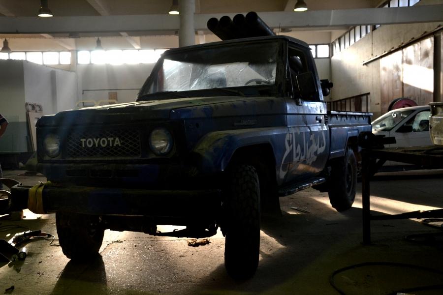 A Toyota Land Cruiser 70 mounted with four Grad missile launchers at a makeshift militia workship in Misrata.