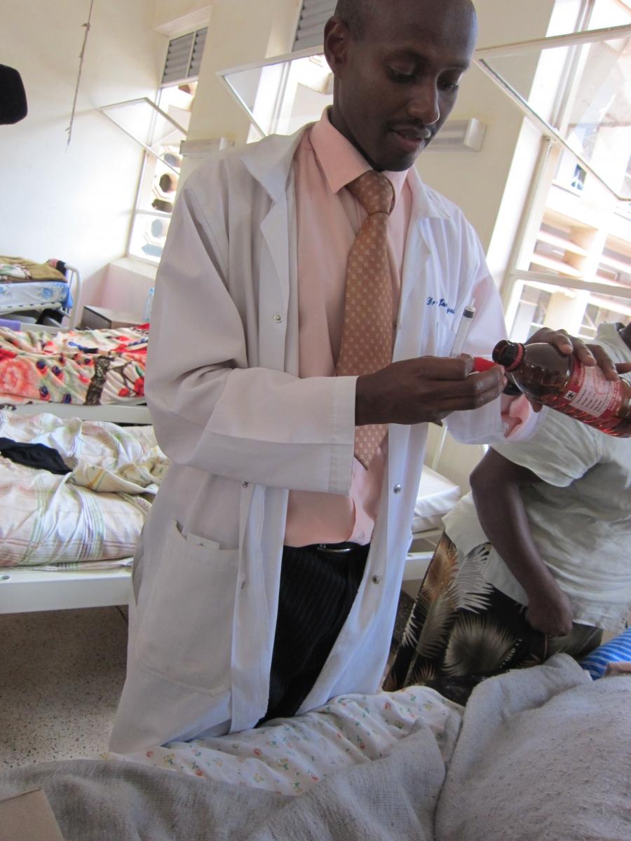 A doctor dispenses morphine at Mulago Hospital in Kampala, Uganda