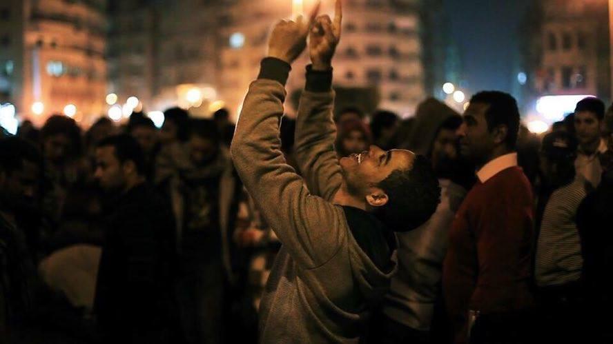 Egyptian protester Ahmed Hassan celebrates in Cairo's Tahrir Square in February 2011 after Mubarak announced he was stepping down.