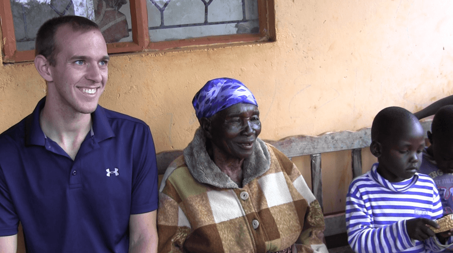 University of California, Santa Barbara graduate student in linguistics Daniel Hieber with Ekegusii-speaking villagers, Kisii district, Kenya.