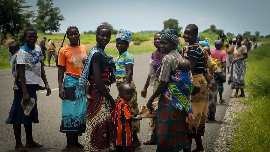 The road to Nsanje, Malawi’s hardest hit region, is lined with women carrying food aid from a local distribution point.