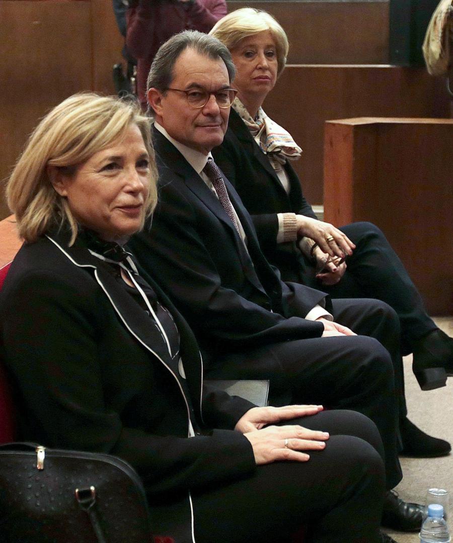 Former Catalan President Artur Mas, center, sitting in court on trial in Barcelona, Spain, on Feb. 6.