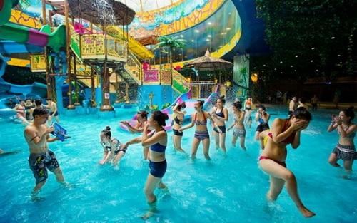 People having a soaking good time at the Vinpearl Water Park in the Royal City district of Hanoi.
