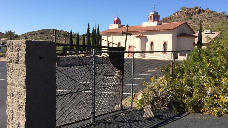 The gate at the St. Nicholas Serbian Orthodox Church in Phoenix was vandalized this past Christmas with graffiti depicting symbols of a Croatian group that historically persecuted Serbs.  