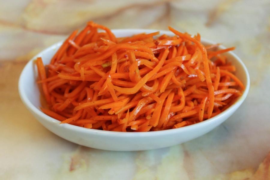 One of Elza Kan's signature dishes — a sweet and spicy shredded carrot salad.