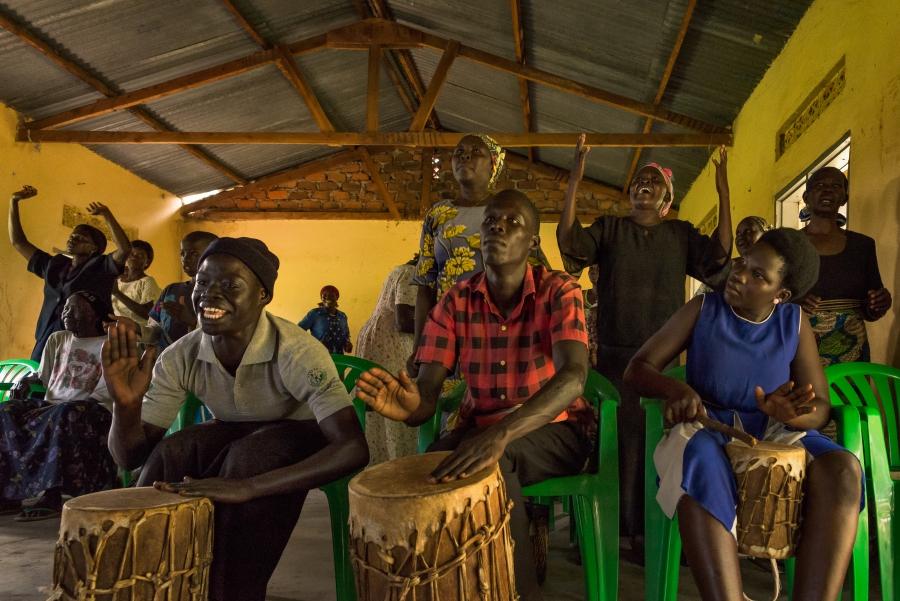 Refugees from Western Equatoria beat animal-skin drums during a PUSH service in northern Uganda.