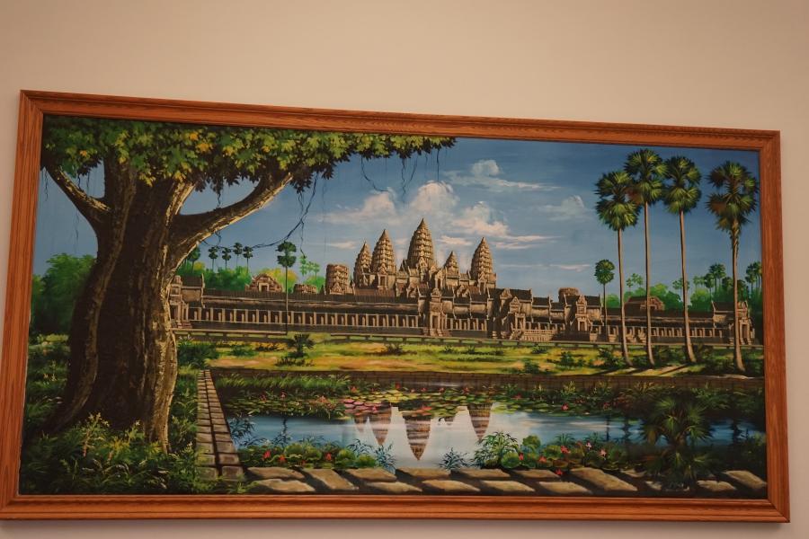 A painting of a Cambodian temple, which hangs on the walls of the Metta Health Center. The clinic is filled with Cambodian artwork, which has been haggled for in the markets of Phnom Penh.